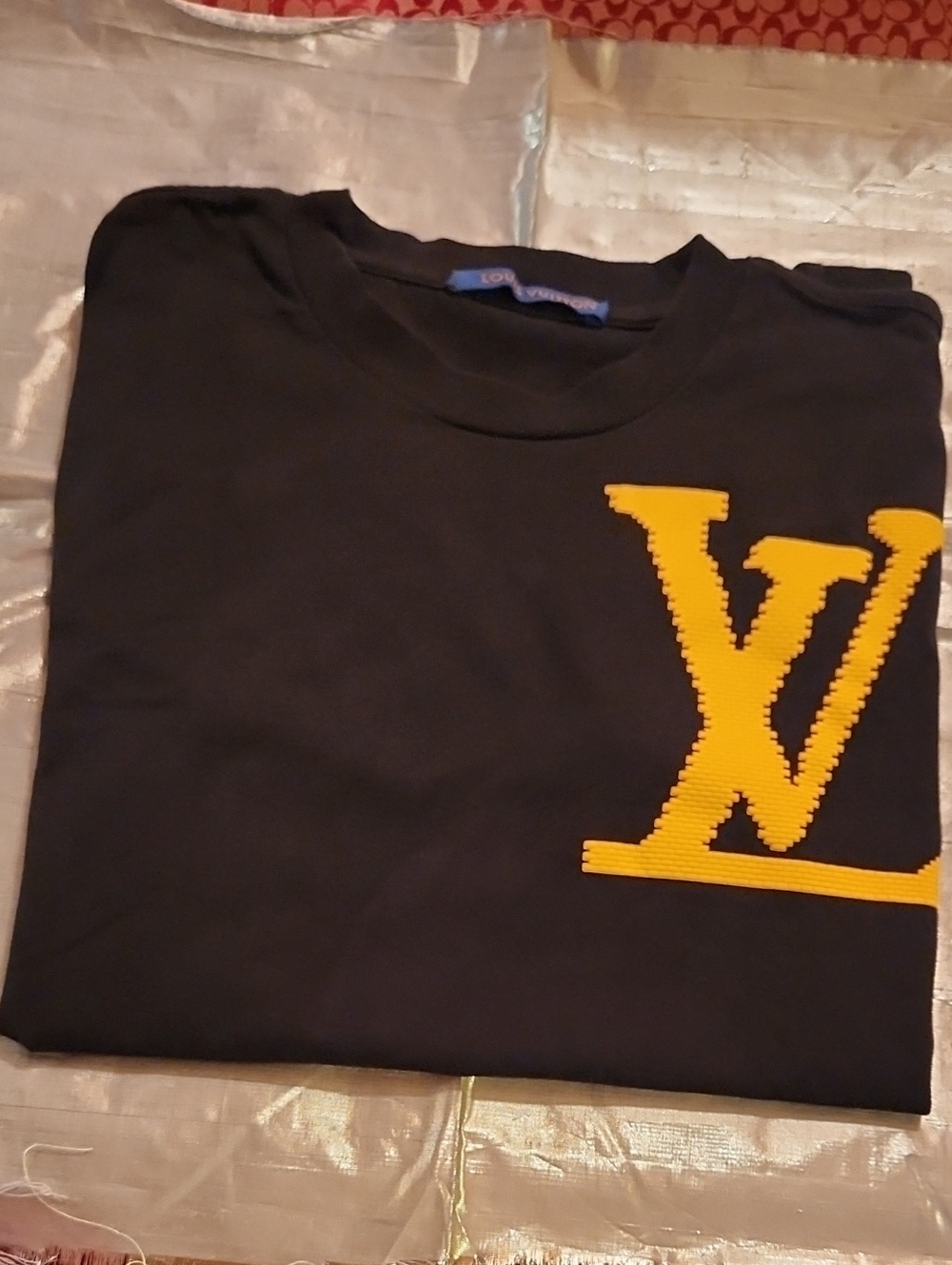 Louis Vuitton Black Tee with Bold Yellow LV Emblem
